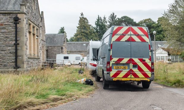 A group of caravans are currently outside the former hospital.