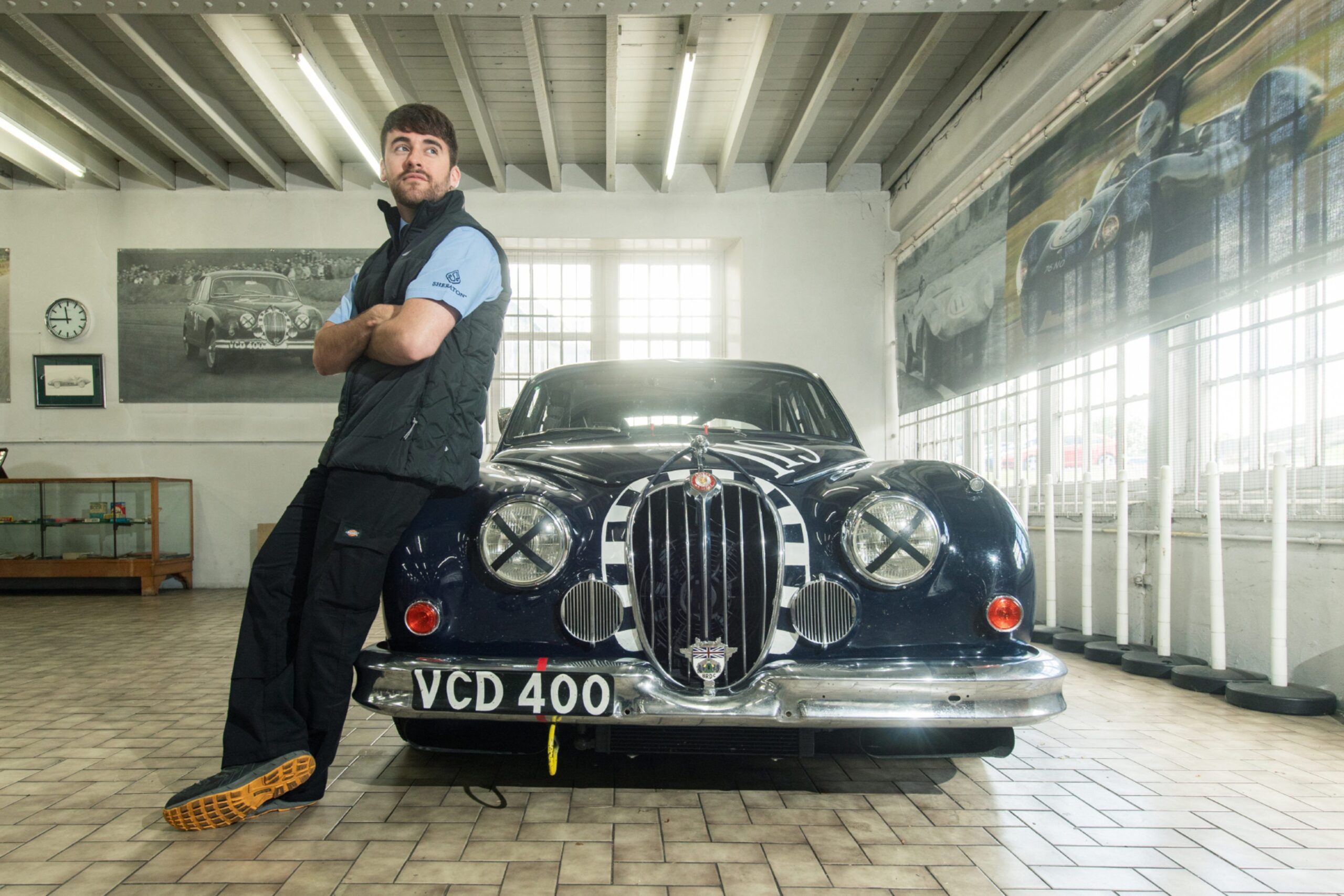 Bruce Mcwhirter with the blue Jaguar Mk2 he races from time to time.