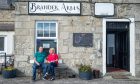 Lynn and Alan Mitchell outside the Brander Arms pub