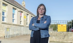 Caitlin Smart outside Rothiemay Primary School.