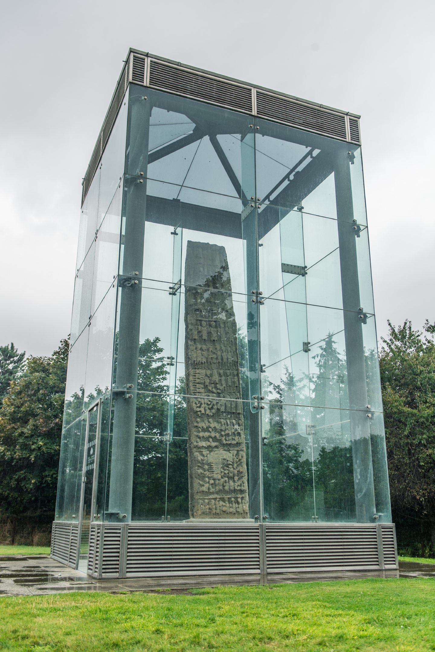 The Pictish Suenoe's Stone in Forres surrounded by glass. 