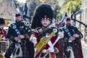 The band proudly marching through Huntly. Image: Jason Hedges/DC Thomson