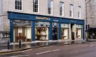 blue frontage of Jamieson & Carry showroom in Aberdeen.