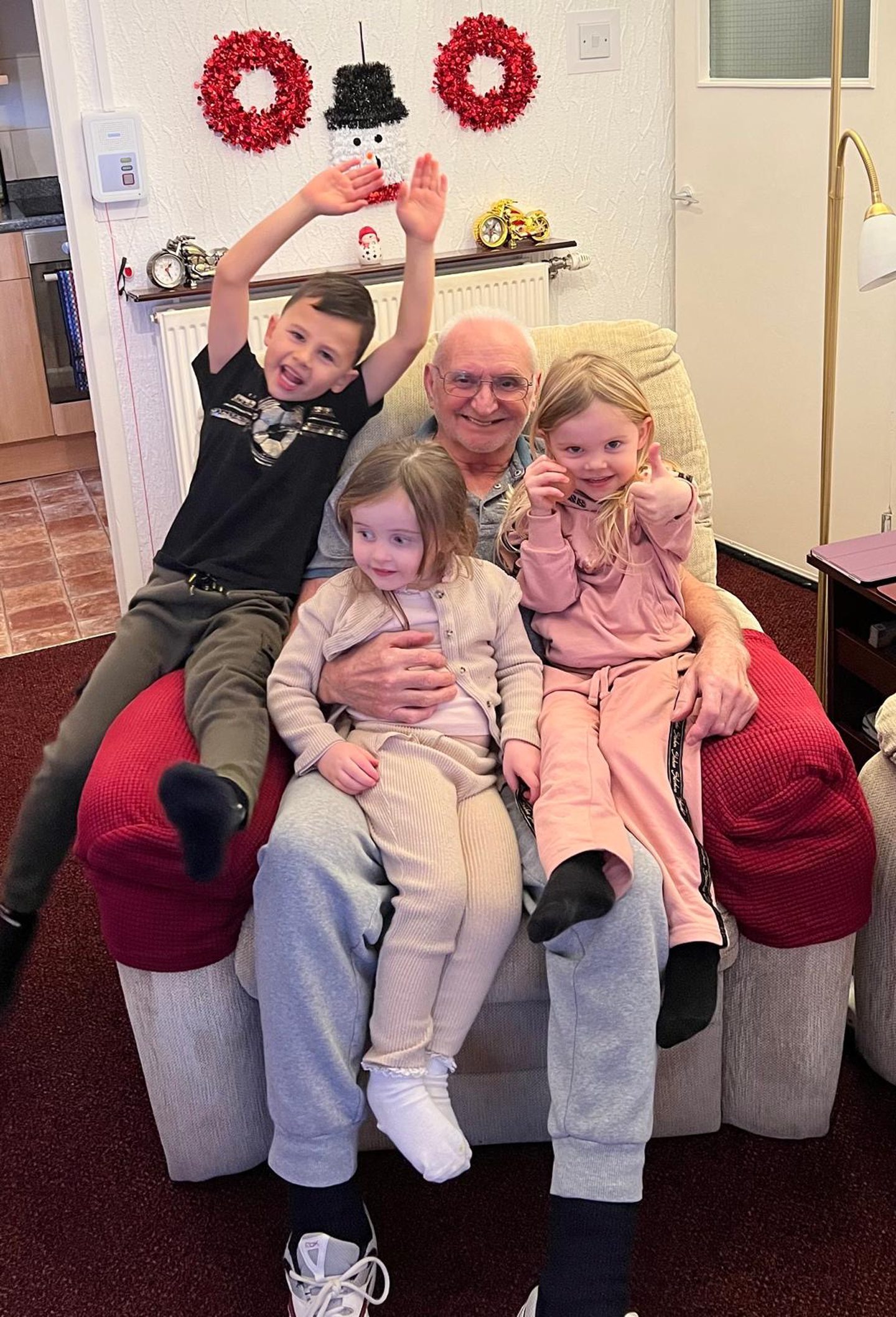 Jim Still with his great grandchildren. 