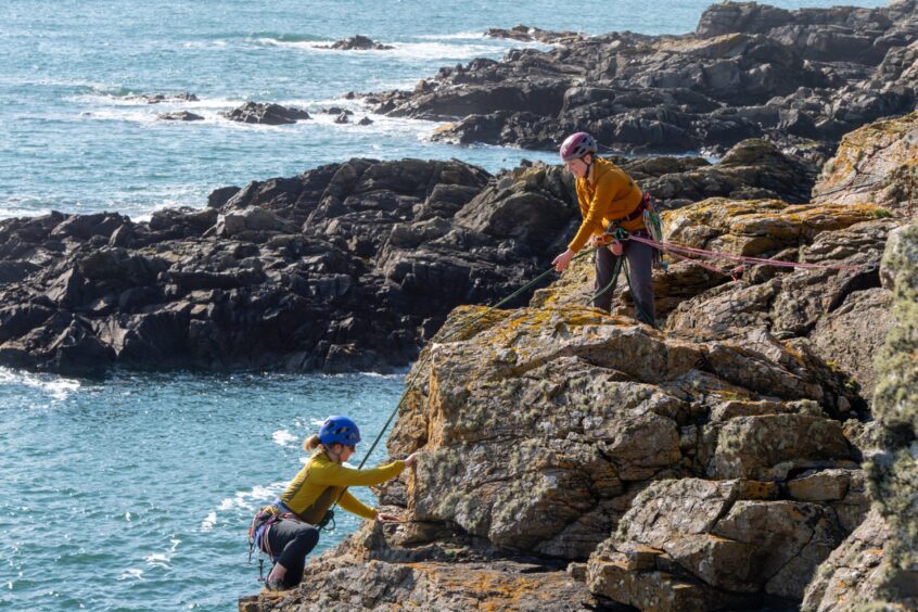 Granite Girls climbing group members in action