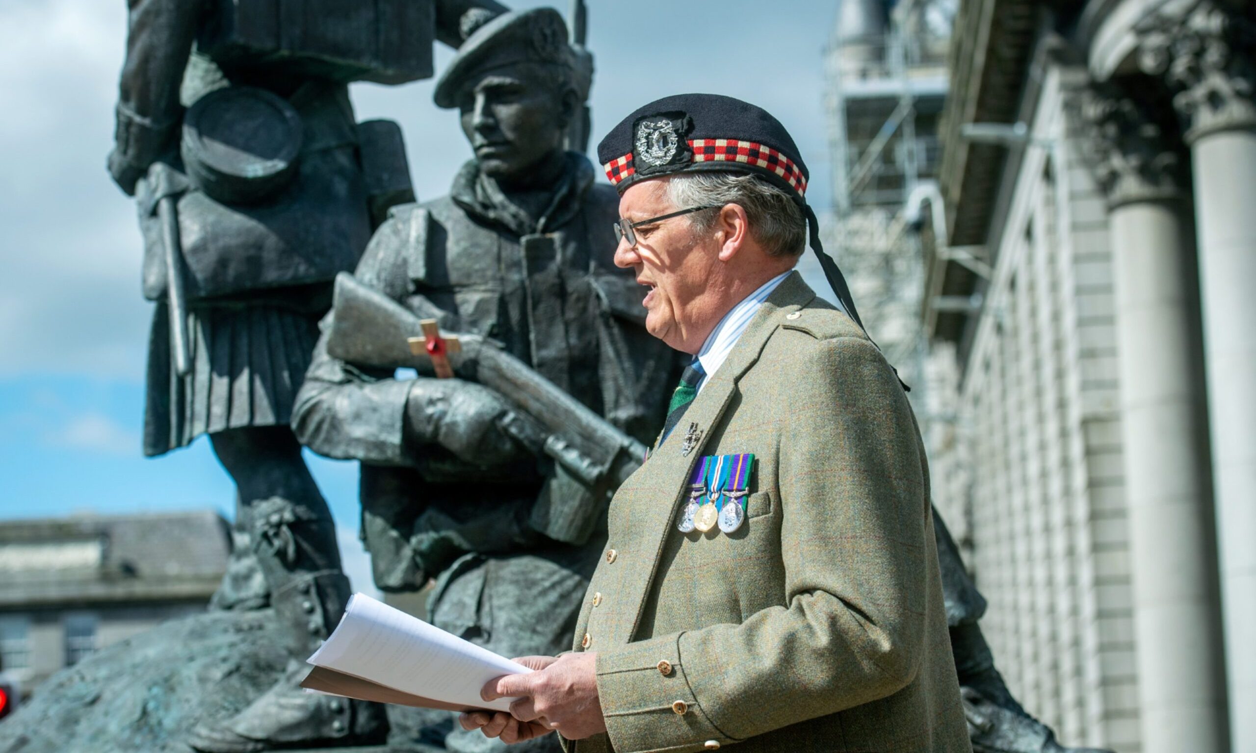 The major at the Gordon Highlanders Statue, on Aberdeen's Castlegate. 