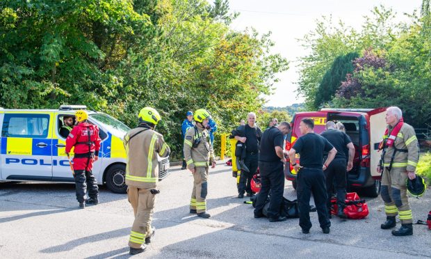 Emergency services searching the cults area.