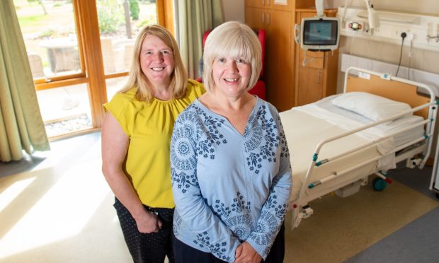 Rachel Anderson, left, and Flora Watson in one of Roxburghe House's palliative care rooms. The two NHS nurses have been based in the building since before it opened in 2004. Image: Kami Thomson/DC Thomson