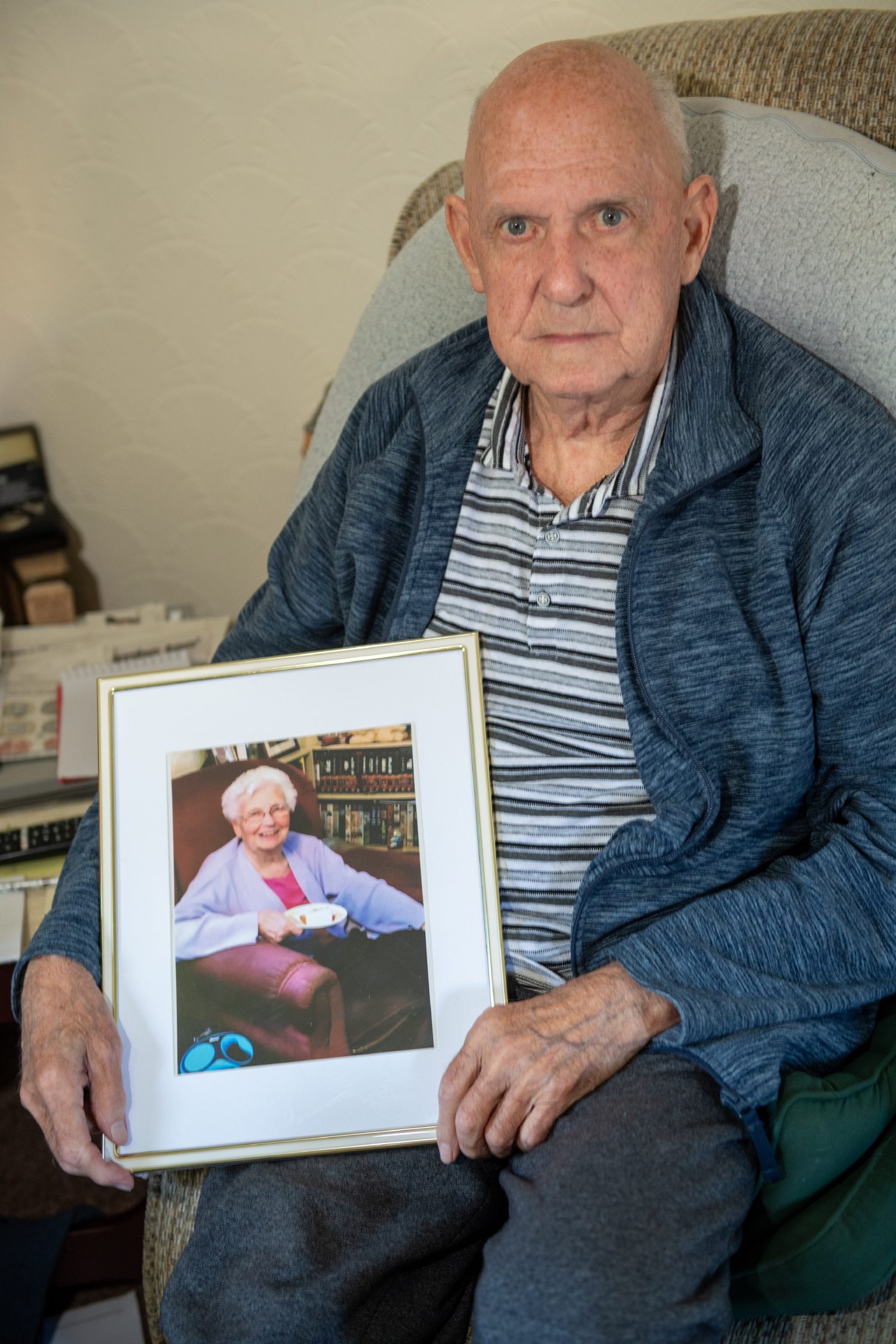 Former soldier Charlie Walker at his Balnagask home, cradling a photo of his late wife Mary.