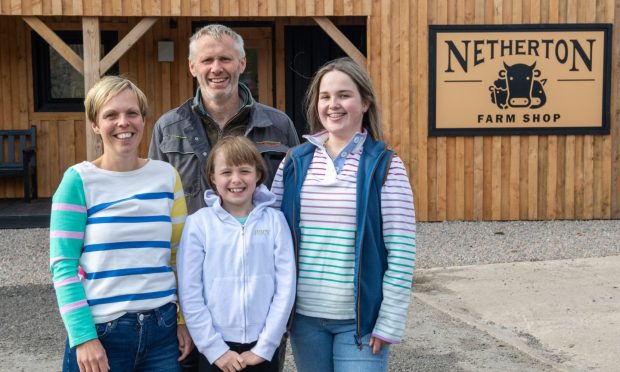 Andrew and Claire with their daughters Hannah and Bethany (right). Images: Kami Thomson/DC Thomson