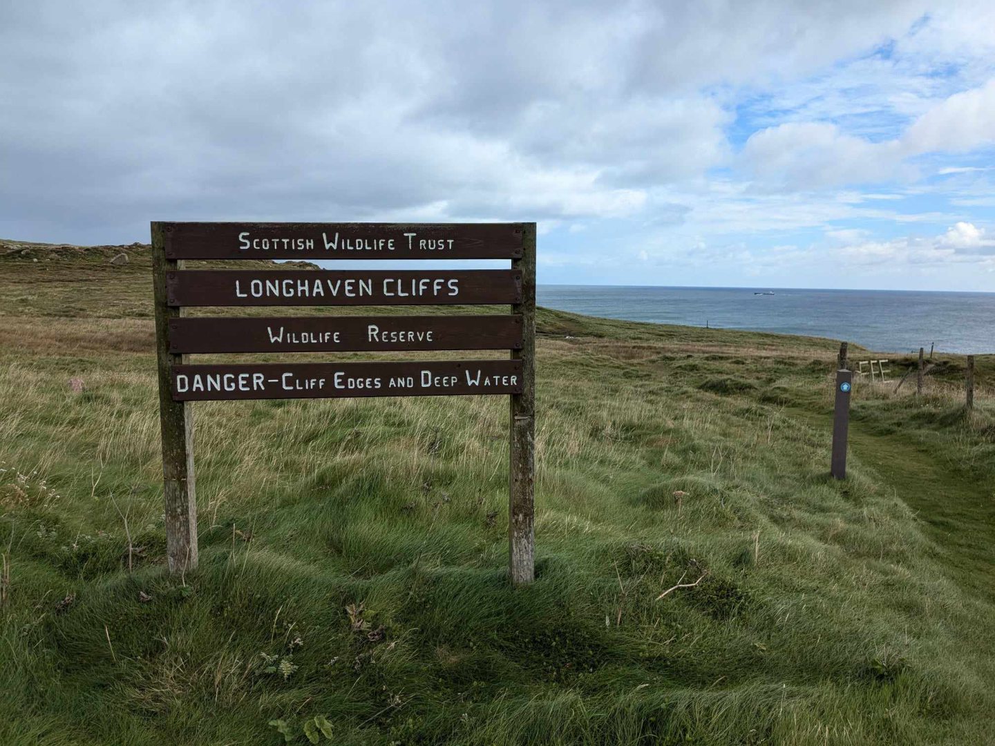 Signpost for Longhaven Cliffs. Image: Gayle Ritchie.