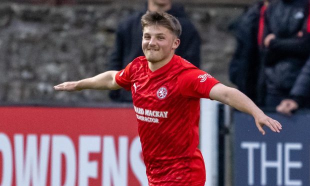 Forres Mechanics manager Steven MacDonald, centre, with new signings Aidan MacDonald, left, and Calum Howarth. Pictures by Sandy McCook