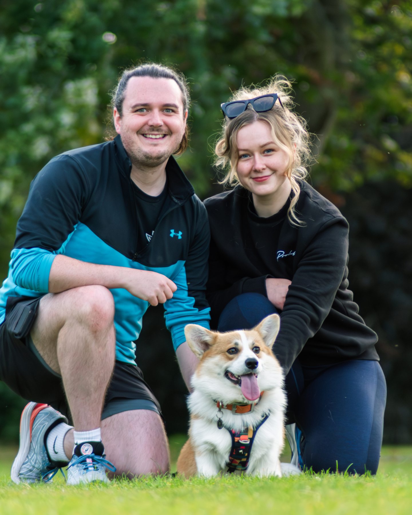 Goose with his owners Niall and Emma who run his instagram account Silly Goose Corgi