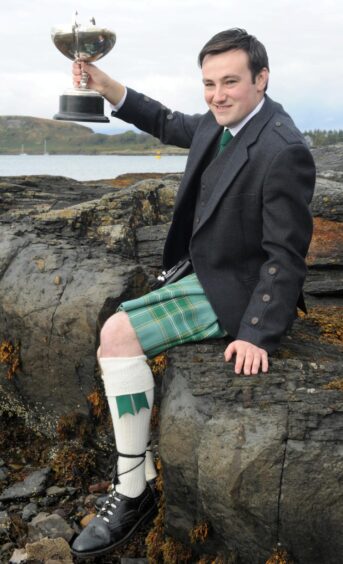 Alasdair Currie of Islay with the Bank of Scotland Cup. 