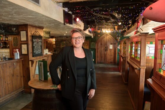 Johnny Foxes general manager Tina MacDonald in the popular Inverness bar. Image: 
Sandy McCook/DC Thomson