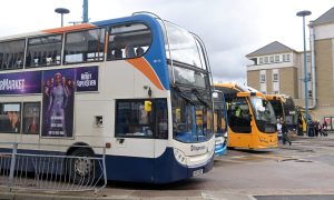 Stageoach double decker among buses lined up at Inverness bus station.