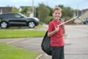 OIiver Legg can often be spotted picking up litter in the Milton of Leys area of Inverness. Image: Sandy McCook/DC Thomson