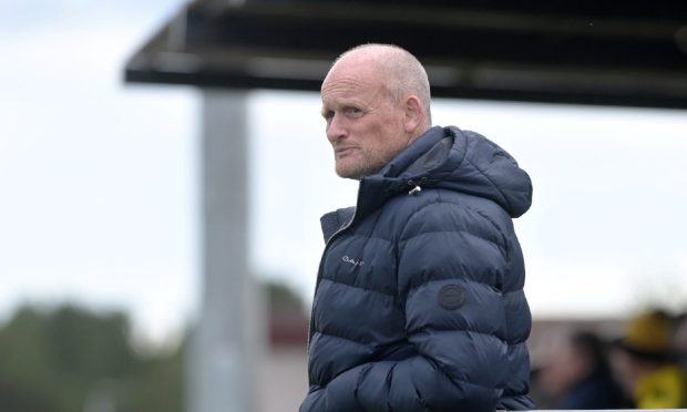 CR0049905
Callum Law,
Aberdeen.
Lossiemouth FC Vs Nairn County FC at Grant park, Lossiemouth.
Lossiemouth interim manager Gavin Price can only watch his teams loss from the grandstand.
14th September '24
Sandy McCook/DC Thomson