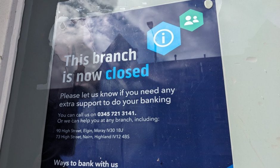 Bank branch closure sign. 