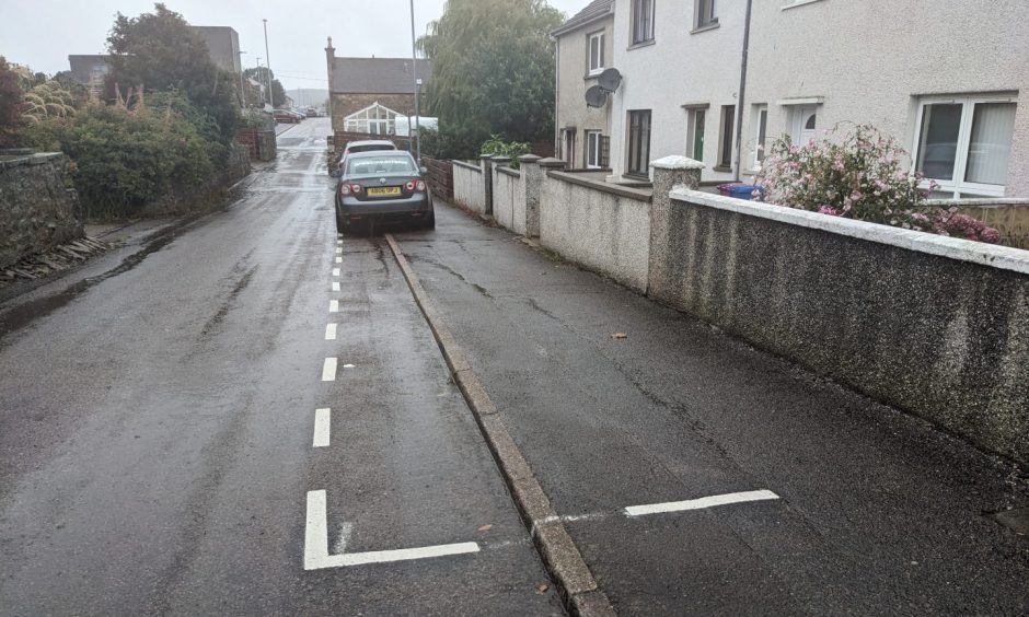 Pavement parking parking bay. 