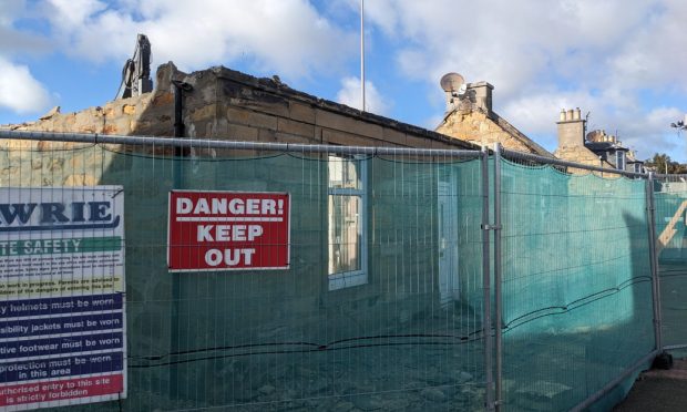 Demolition of Elgin homes.