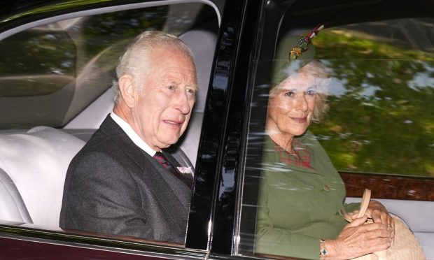 King Charles III and Queen Camilla arrive at Crathie Kirk, near Balmoral, for the Sunday church service. Image: Aaron Chown/PA Wire