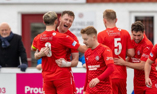 Shane Sutherland celebrates scoring for Brora Rangers against Cumnock in the Scottish Cup. Pictures by Jasperimage.