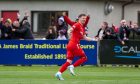 Shane Sutherland celebrates scoring for Brora Rangers against Cumnock in the Scottish Cup. Pictures by Jasperimage.