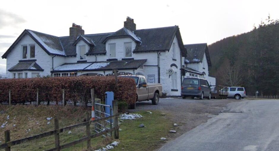 View of the The WhiteBridge Hotel looking uphill from the road.