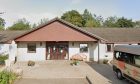 Entrance to Cradlehall care home in Inverness with minibus outside.