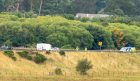 Officers at the scene of a crash on the A9 at Kingussie. Image: Jasperimage.