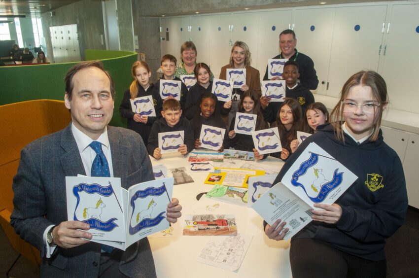 Education convener Martin Greig with pupils at St Peter's RC School in Aberdeen. Image: Aberdeen City Council