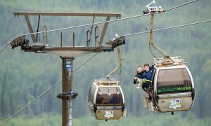 Graeme Macmillan (Lovat captain) and Calum Grant (Kingussie captain) with the new Tulloch Homes Camanachd Cup trophy at Nevis Range, overlooking Fort William - where the final will take place. Image: Neil G Paterson.