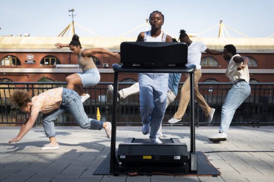 Group of dancers on a rooftop in Aberdeen.