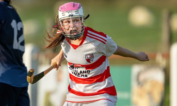 Lorne Mackay in action against Newtonmore in the 2018 Camanachd Cup final.