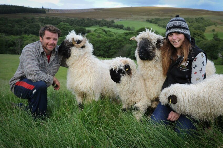 Raymond and Jenni with a few of their flock.