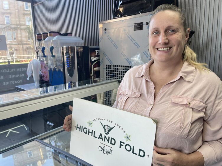 Veronica Mackenzie with her Highland Fold ice cream sign