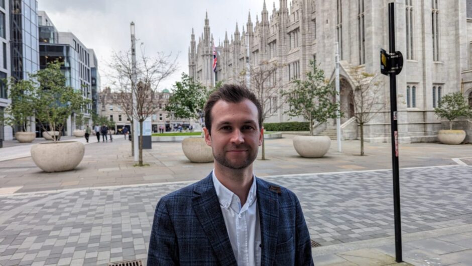 Uber's Matthew Freckelton outside Aberdeen Town House after his company gained a licence to operate in the city.