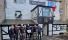 From left: John Wink, Mark Anderson, Scott McCombie, Bruce McCombie, Ashley Adams, Karan Batra, Calum Wright and Philip Adams outside the Stag Hotel in Banchory.