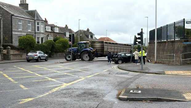 Tractor and car involved in crash on Ellon Road. Image: DC Thomson.