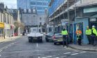 Police officers have locked down the busy Aberdeen street. Image: Jamie Sinclair/DC Thomson