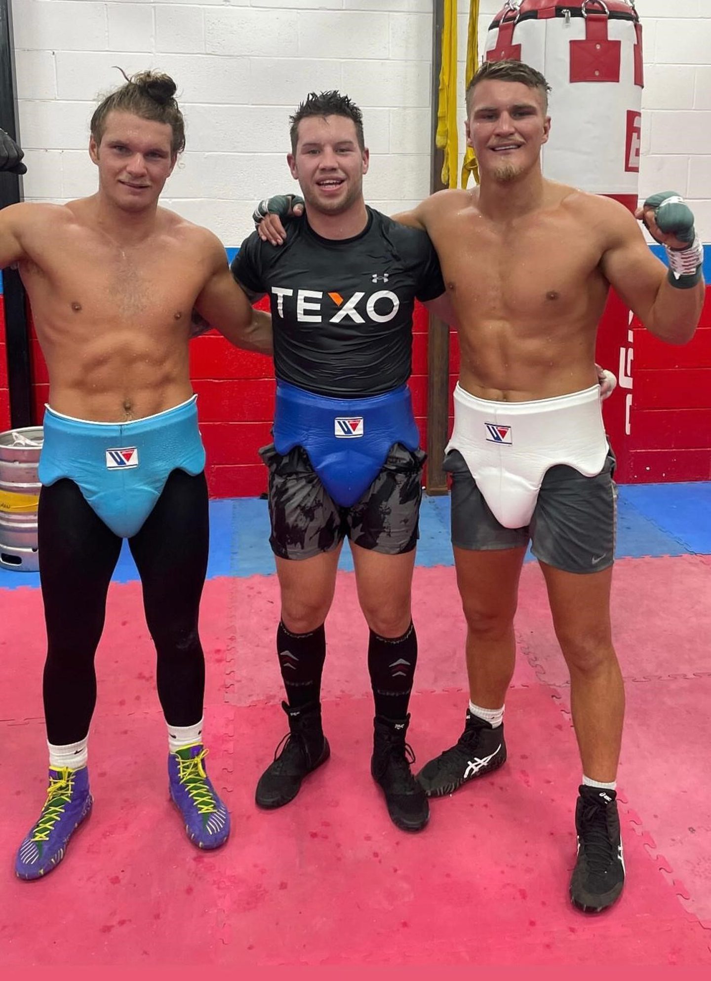 Aberdeen boxer Dean Sutherland (centre) with Jack Rafferty (left) and Tom Rafferty (right). Image supplied by Dean Sutherland 