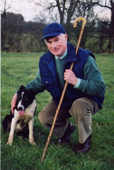 Hugh Munro, pictured with one of his dogs, Tess, in 2004.