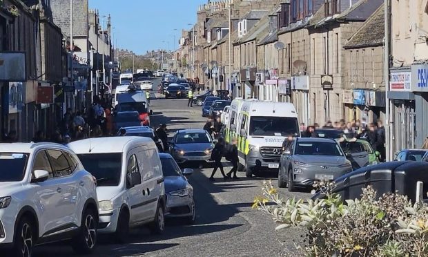 Police have locked down Peterhead's Queen Street. Image: Coast Radio/Buchan Live