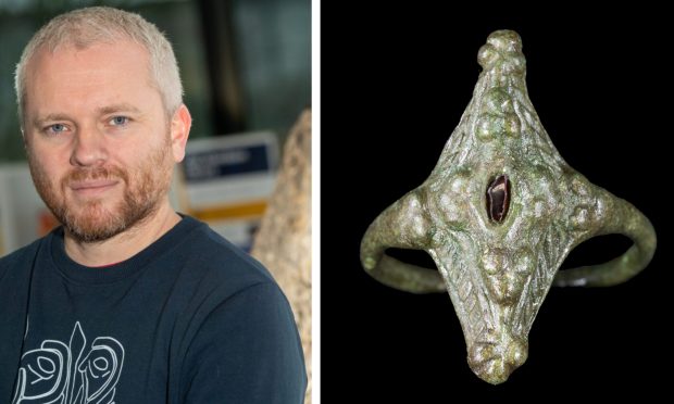 Prof Gordon Noble, left, and the ring recently discovered at Burghead. Images: DC Thomson/Aberdeen University.