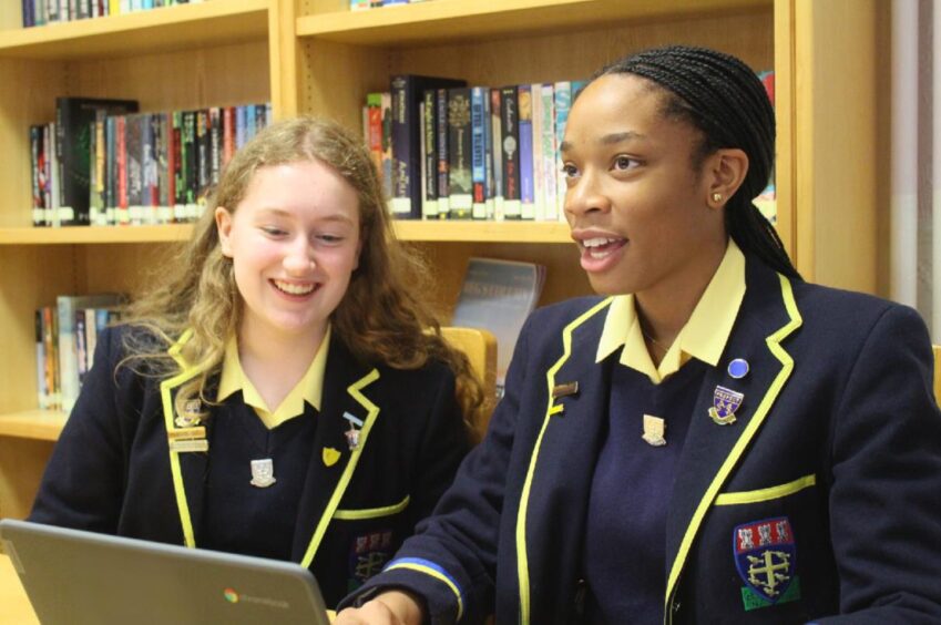 two girls in school uniform at Albyn international school.