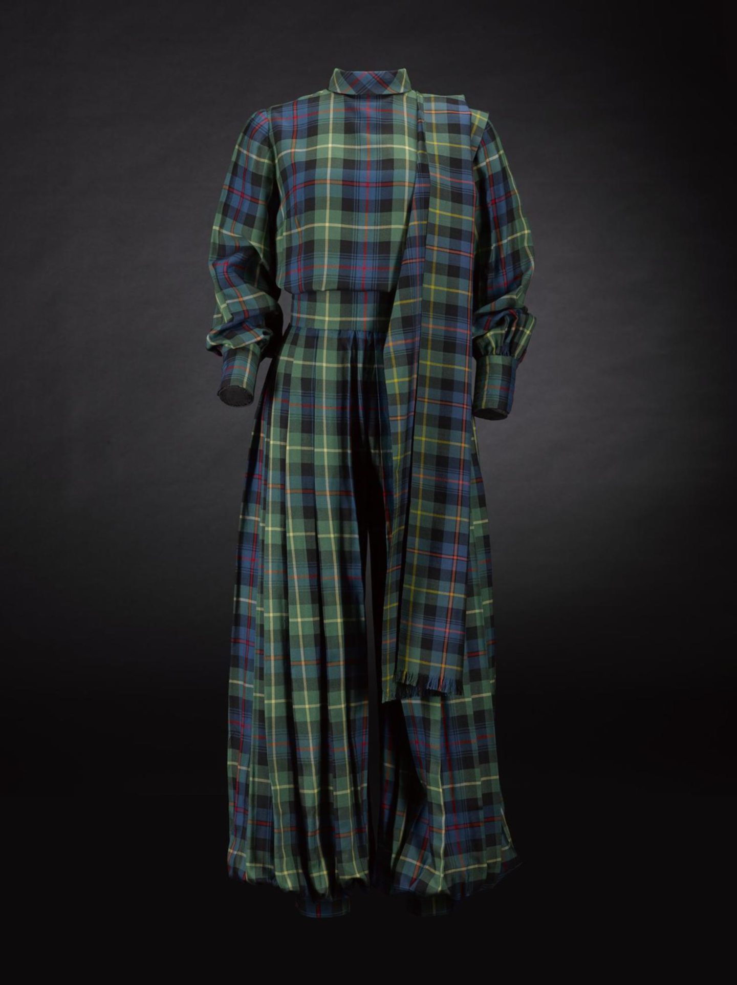 suit was worn by the flamboyant fashion editor turned Highland society hostess Frances Farquharson.