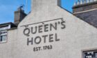 Queen's Hotel sign