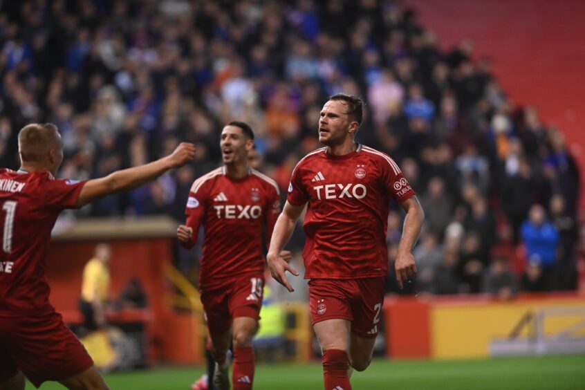 Nicky Devlin celebrating.