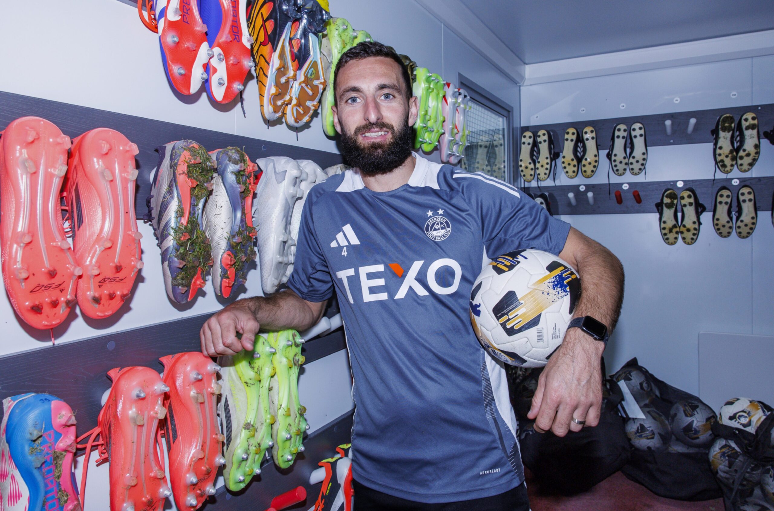 Graeme Shinnie in the boot room at Cormack Park. Image: SNS 